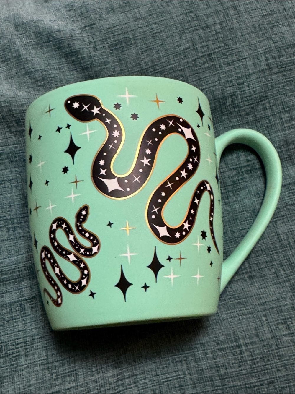 Mint Green Ceramic Snake Mug with Star Accents
